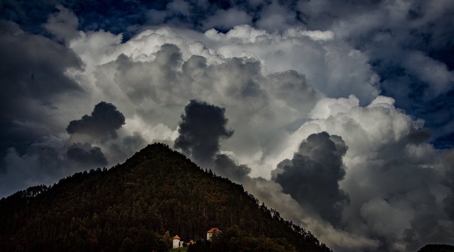 Beautifull clauds over the Laško castle - home to Pavus restaurant