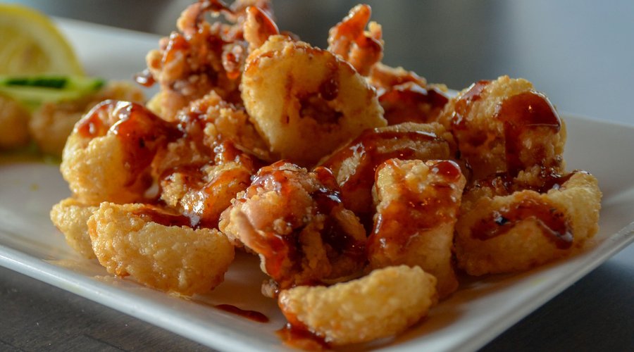 Flash-fried calamari drizzled in an Asian-ginger sauce.