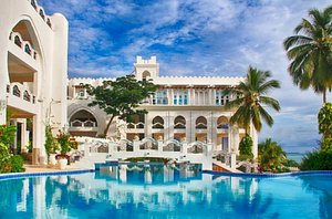 Madinat Al Bahr Business & Spa Hotel in Zanzibar Island, image may contain: Villa, Housing, Resort, Hotel