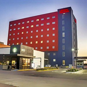 Habitaciones y Suites business class, Ubicado en el corazón industrial de Guanajuato, frente a la planta Mazda con servicios de hospedaje de primer nivel.