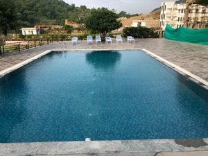 Via Lakhela Resort & Spa in Kumbhalgarh, image may contain: Hotel, Resort, Pool, Water