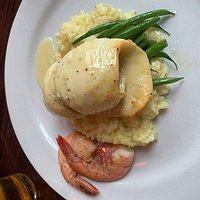 Crab stuffed flounder over lemon risotto. The shrimp were my addition :)