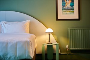 The Central Private Hotel by Naumi Hotels in Queenstown, image may contain: Lamp, Table Lamp, Painting, Furniture