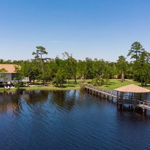 Each cottage is situated on the northern shore of Lake Shelby in Gulf State Park