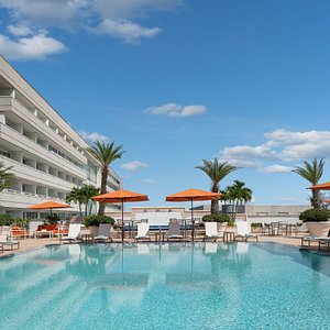 Hyatt Regency Orlando International Airport in Orlando, image may contain: Hotel, Resort, Plant, Pool