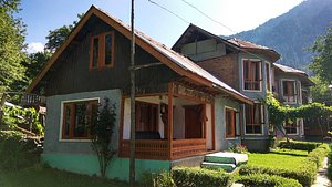Paradise Guest House in Pahalgam, image may contain: Hotel, Resort, Cottage, Villa