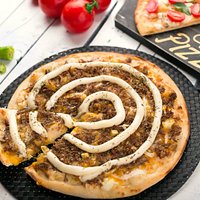 Nossa pizza especial de carne de sol.