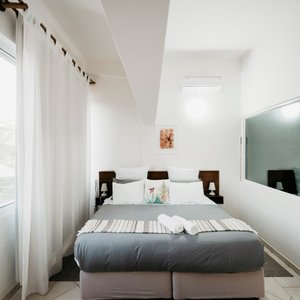 Suite, com vista para a baía.