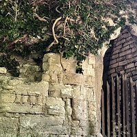 boarded up old stone staircase of St. Olof Church ruins