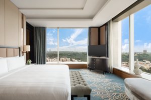 Shangri-La Bengaluru in Bengaluru, image may contain: Penthouse, Building, Furniture, Monitor
