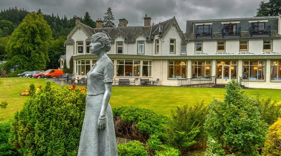 lady of the loch statue in hotel grounds.