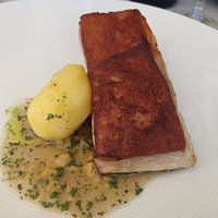 Pancia di vitello caramellata in salsa orientale con la patata bollita