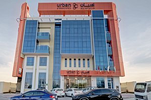 Urban Al Khoory Hotel in Dubai, image may contain: Office Building, City, Shopping Mall, Car