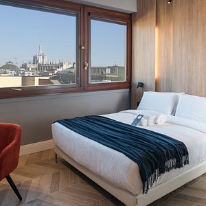 B&B Hotel Milano City Center Duomo in Milan, image may contain: Interior Design, Penthouse, Bed, Furniture