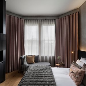 Hotel Fitzroy curated by Fable in Auckland Central, image may contain: Home Decor, Interior Design, Furniture, Cushion