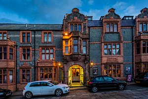 The Castle Hotel in Conwy, image may contain: City, Housing, Urban, Car