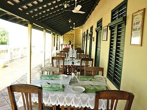 Lakshmi Vilas in Chidambaram, image may contain: Dining Table, Table, Dining Room, Restaurant