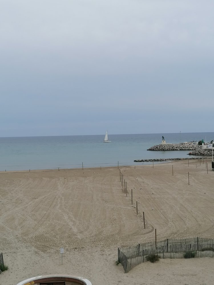 Phare de la Méditerranée between two hotels in Palavas les Flots, near  Carnon Plage, Montpellier, Occitanie, South of France Stock Photo - Alamy