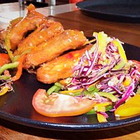 CHICKEN WINGS (4pcs) Succulent Sticky Honey Glazed Chicken Wings tossed in bell peppers.