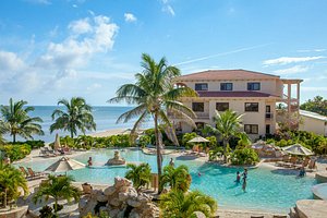 Coco Beach Resort in Ambergris Caye, image may contain: Villa, Hotel, Resort, Summer