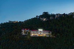 Larisa Shimla in Shimla, image may contain: Resort, Hotel, Vegetation, Woodland