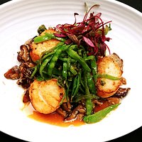 George’s Bank U-10 Scallops, Shiitake- Ragout, Asparagus, Sesame-Almond and Ginger Sambal.