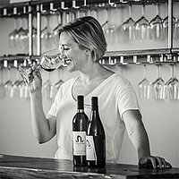 Owner/Winemaker Alexandra is already ready to pour you a glass!