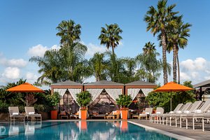 Four Seasons Hotel Los Angeles at Beverly Hills in Los Angeles, image may contain: Resort, Hotel, Villa, Chair