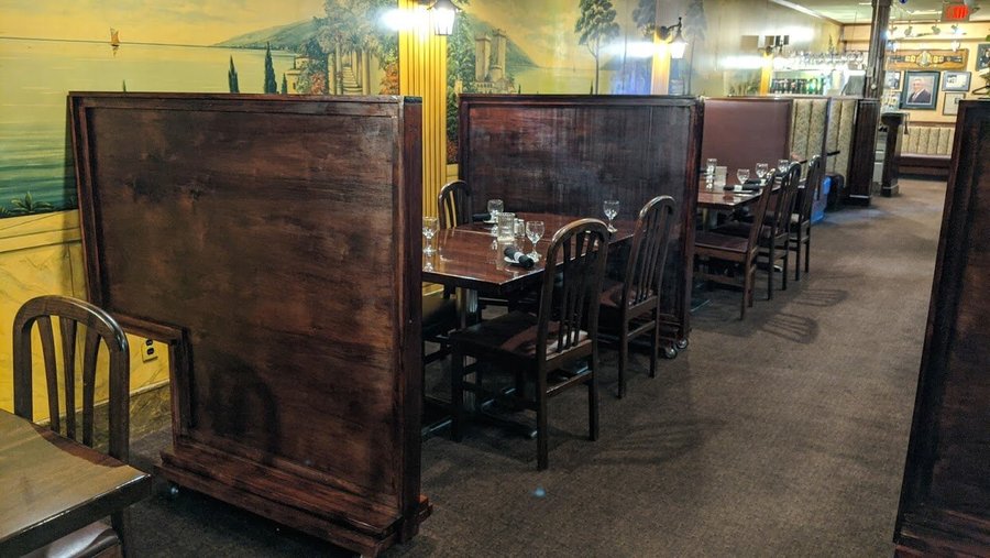Italian Murals painted on every wall, honoring Ilio's homeland and creating an Italian ambiance like no other.  