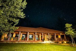 The Earth at Ranthambore in Sawai Madhopur, image may contain: Hotel, Villa, Resort, Night
