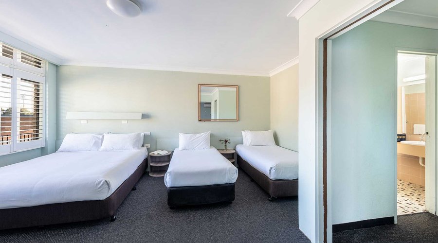 The Premium Family Room at the Panorama Motel Bathurst is spacious and clean and features one queen and two single beds