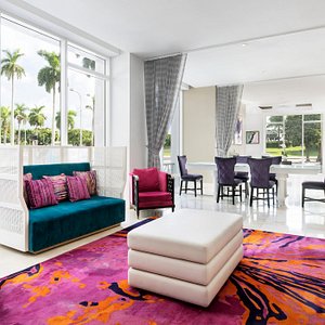 YVE Hotel Miami in Miami, image may contain: Home Decor, Rug, Living Room, Table