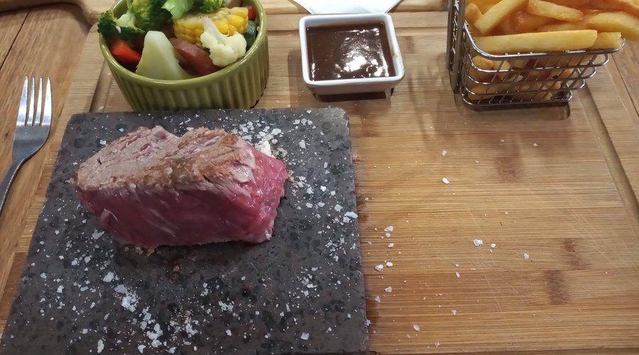 Eye fillet cooked on hot rocks