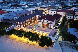 Tembo House Hotel in Zanzibar Island, image may contain: Neighborhood, Resort, Hotel, City