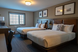 Best Western Gold Rush Inn in Whitehorse, image may contain: Furniture, Bed, Bedroom, Chair