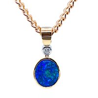 A client's opal was set in this stunning pendent with diamond in 18ct gold.