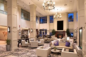 Embassy Suites by Hilton Portland Maine in Portland, image may contain: Home Decor, Living Room, Dining Room, Reception Room