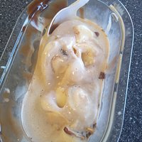 about half eaten sundae with very little chocolate on the corner- this is all I got to blend in with the ice cream.
