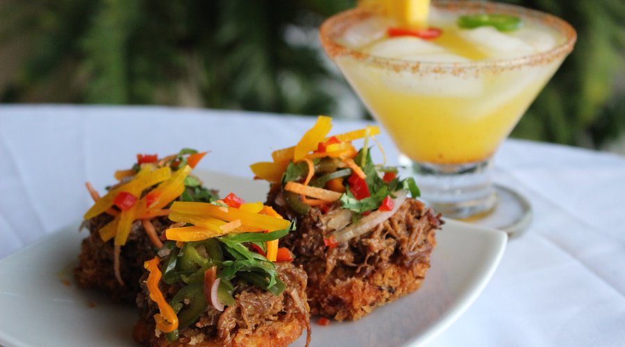 Thai red curry beef on crispy plantains, spicy pineapple jalapeno margarita