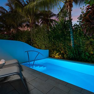 H2O Suites Hotel in Key West, image may contain: Home Decor, Interior Design, Furniture, Bench