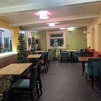 Tables are spaced, with our social distancing Christmas trees!