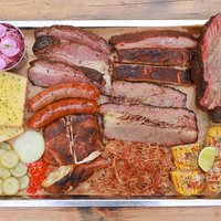 From the Smoker: Beef Ribs, Beef Brisket, Beef Pastrami, Pork Ribs, Pulled Pork, Grilled Smoked Sausages, Chicken Leg, Pink Slaw, Mexican Corn, Texas Toast