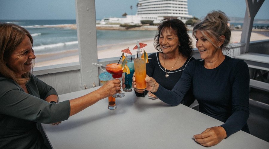 Friends sipping cocktails