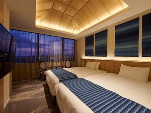 Izumo Royal Hotel in Izumo, image may contain: Lighting, Bed, Resort, Hotel