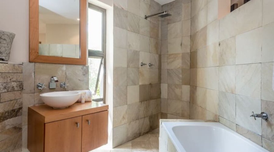 A bath and shower with all the amenities as well as a hair dryer is available.