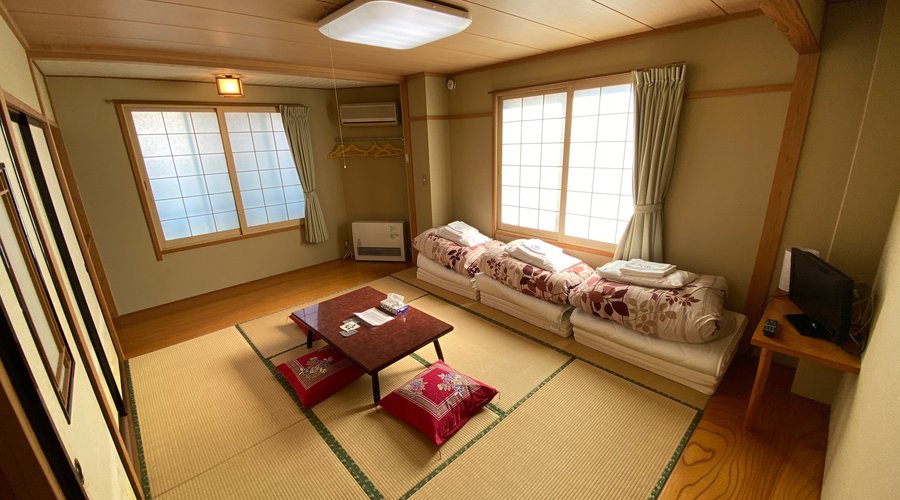 13 square meters room with private toilet and shared bathroom (up to 4 Guests, recommended up to 3)