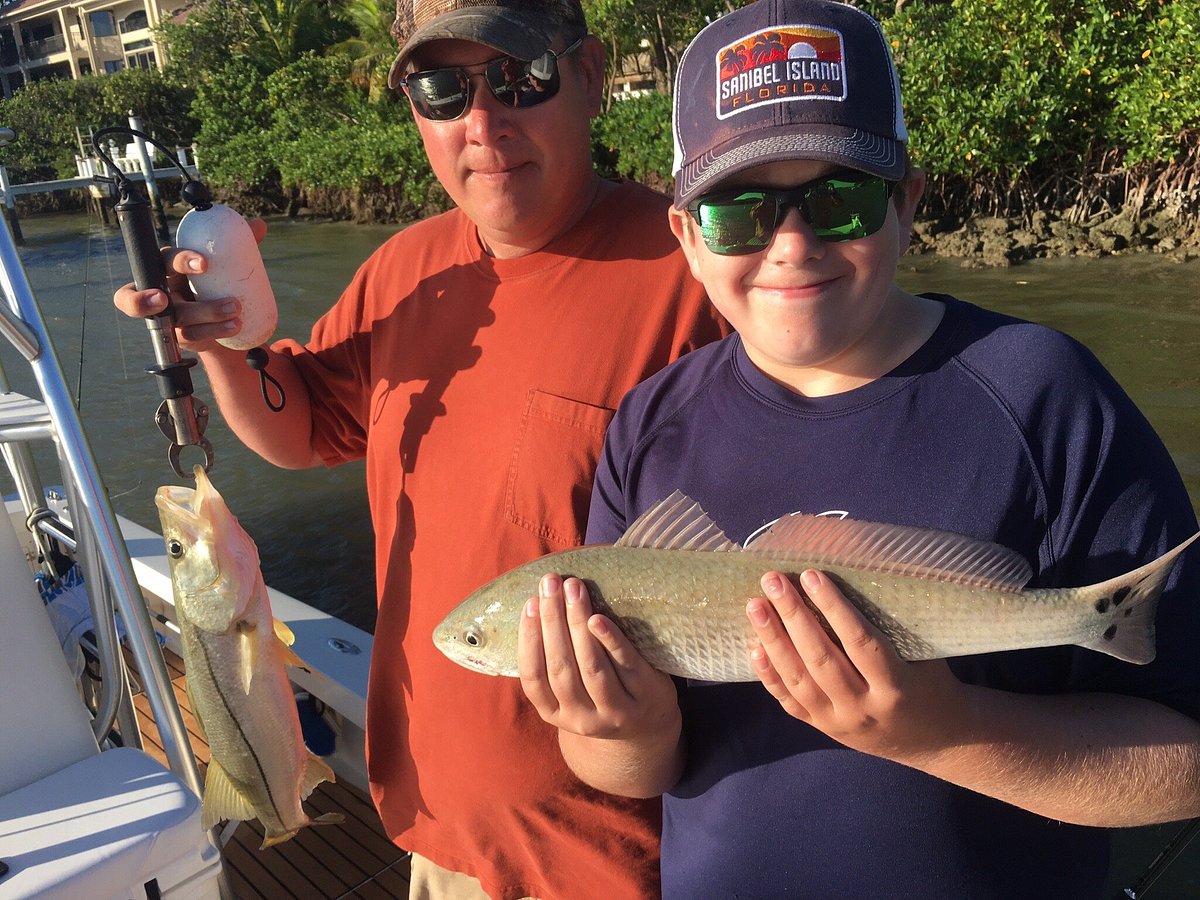 Fishermen reel in 12-foot tiger shark on Sanibel Island beach