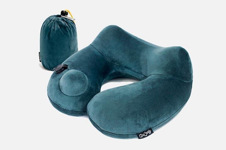 A green inflatable neck pillow