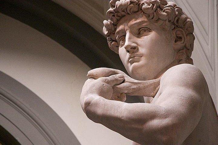A closeup of Michelangelo's David.