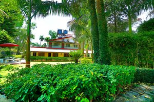 Hotel Samiralok in Mount Abu, image may contain: Resort, Hotel, Villa, Plant